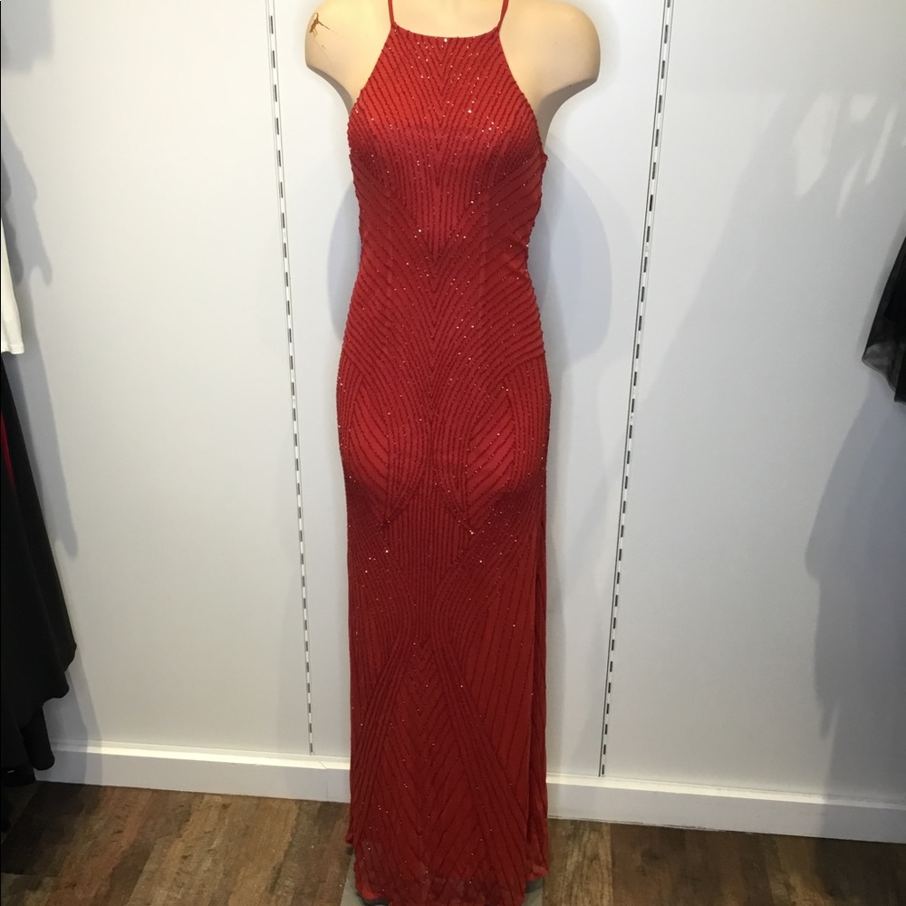 Stunning red beaded floor length gown